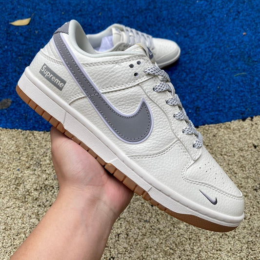 Dunk low X Suprême