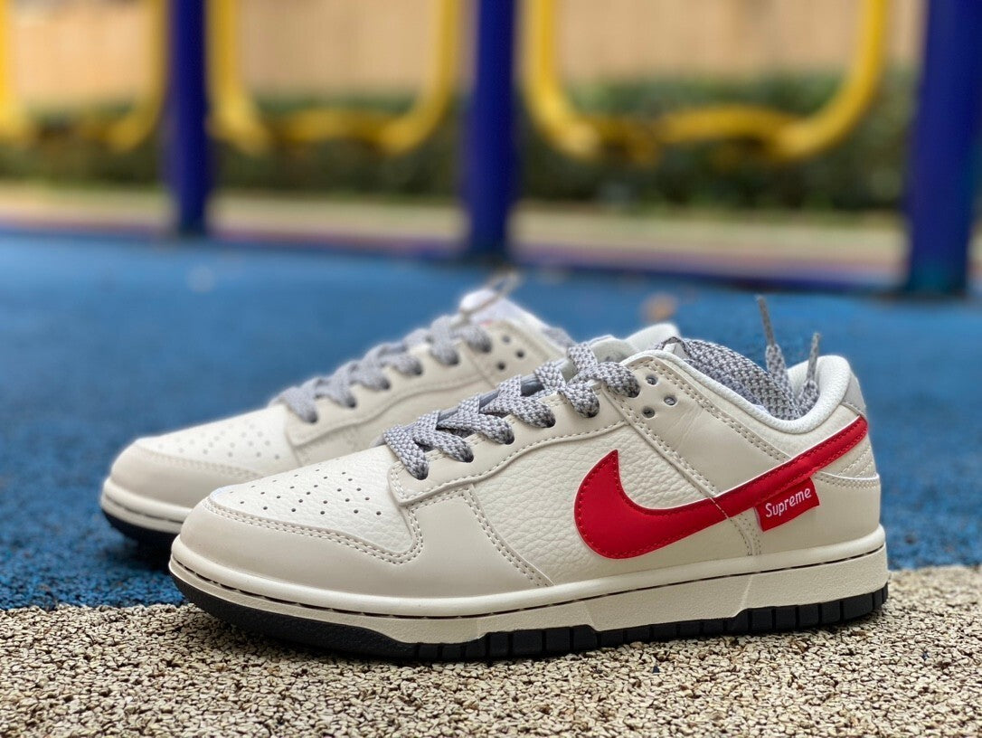 Dunk low X Suprême